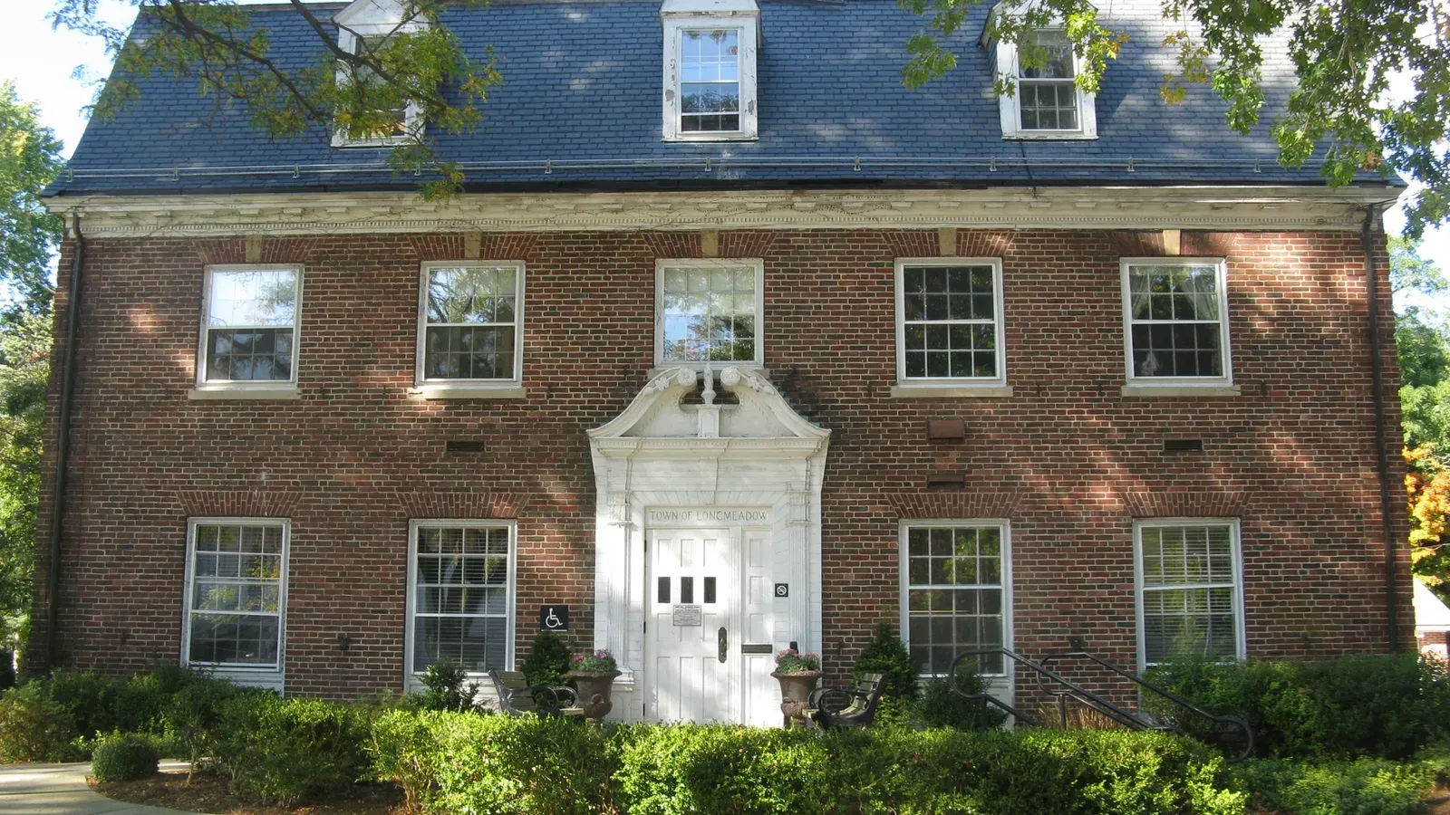 Brick Colonial Revival town office building on the green, Longmeadow, Massachusetts